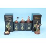 Five boxed Merlin collection figure groups