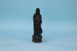 A hard stone figure of Guanyin, 28.5cm height x 8cm width approx.