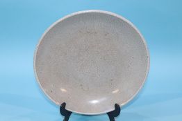 A crackle ware dish, 5cm height x 26cm diameter approx.