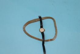 A 9ct gold necklace, 26.4 gram and a 9ct ladies watch