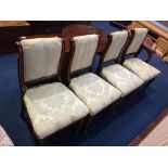 A set of four Victorian mahogany dining chairs