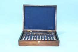 A canteen of cutlery in a rosewood box