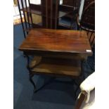 A small Edwardian mahogany two tier fold over card table
