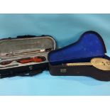 A John Greg and sons banjo and case, and a Chinese violin