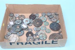 A collection of various Oriental coins/tokens