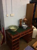 A yew wood pedestal desk and a corner cabinet