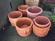 Six terracotta plant pots