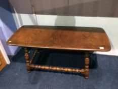 An Ercol oak coffee table