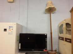 A Sony TV and teak lamp