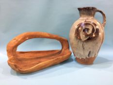 A Studio pottery jug and a wooden bowl