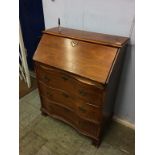 A serpentine fronted bureau