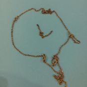 A gold coloured necklace