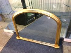 A modern gilt over mantle mirror