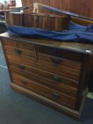 An Edwardian chest, with two short and two long drawers, 107cm wide