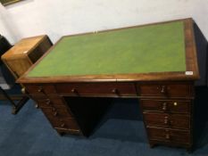 A late Victorian pedestal desk, with green inset top, 122cm wide