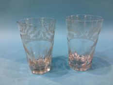 A pair of etched commemorative glasses