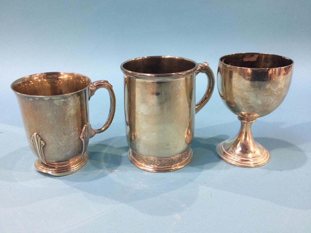 Two silver tankards and a goblet, 18 oz
