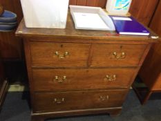 An oak chest, with two short and two long drawers, 90cm wide