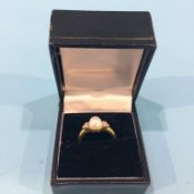 A pearl mounted ring, 18ct?