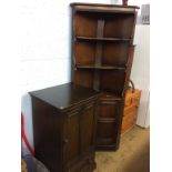 An Ercol corner cabinet and hifi cabinet