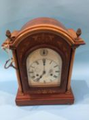 A mahogany mantle clock