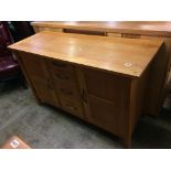 A light oak modern sideboard, 130cm wide