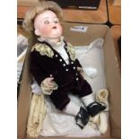 An Armand Marseille bisque headed doll