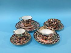 Four Royal Crown Derby Imari pattern cups and saucers