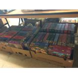 A large quantity of jigsaw puzzles, in four boxes
