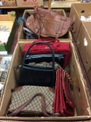 A quantity of handbags in two boxes