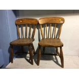 A pair of Childs spindle back chairs