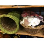 A quantity of linen and two baskets