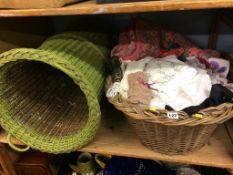 A quantity of linen and two baskets