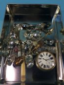 A large pocket watch, various spoons etc.