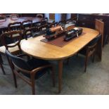A set of six Kai Christensen style teak dining chairs, with black vinyl upholstered back and