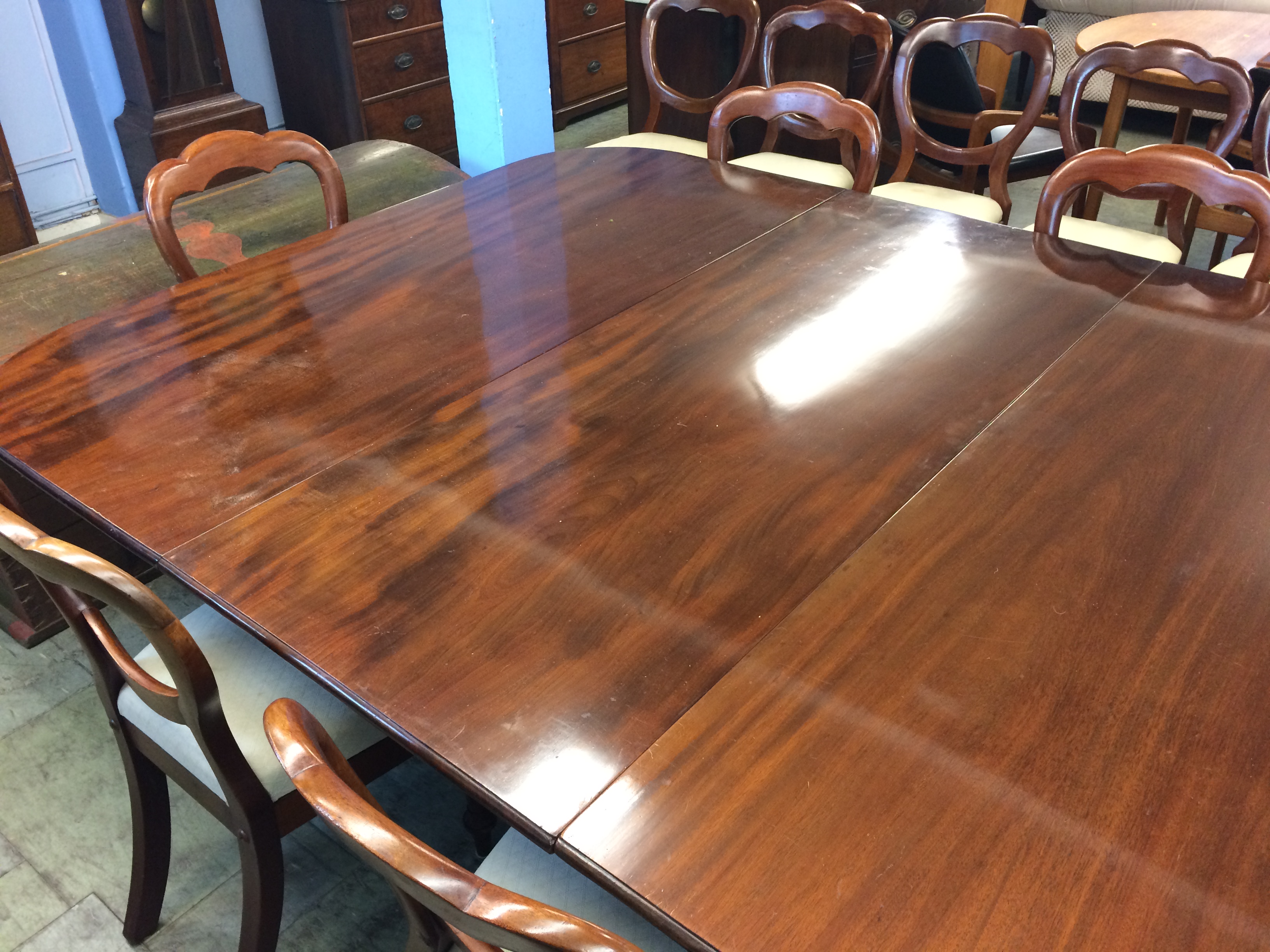 A 19th century mahogany extending dining table, with two extra leaves, supported on fluted and - Image 2 of 3