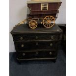 A pair of distressed pine and painted bedside chests, with three long drawers. 83cm wide