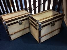 Two modern leather cabin trunks