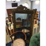 A late 19th century gilt over mantle mirror. 147cm x 85cm