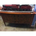 An Edwardian mahogany bowfront sideboard. 153cm long