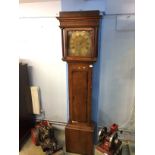 A large 19th century oak longcase clock, with brass dial, three hour movement, by Webster and Son,