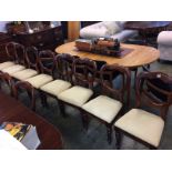 Two sets of eight Victorian mahogany dining chairs, with drop in seats, supported on turned tapering