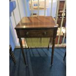 A 19th century mahogany work box, the rectangular top opening to reveal a writing slope and fitted