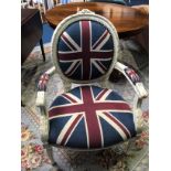 A cream painted French style armchair, with Union Jack upholstery