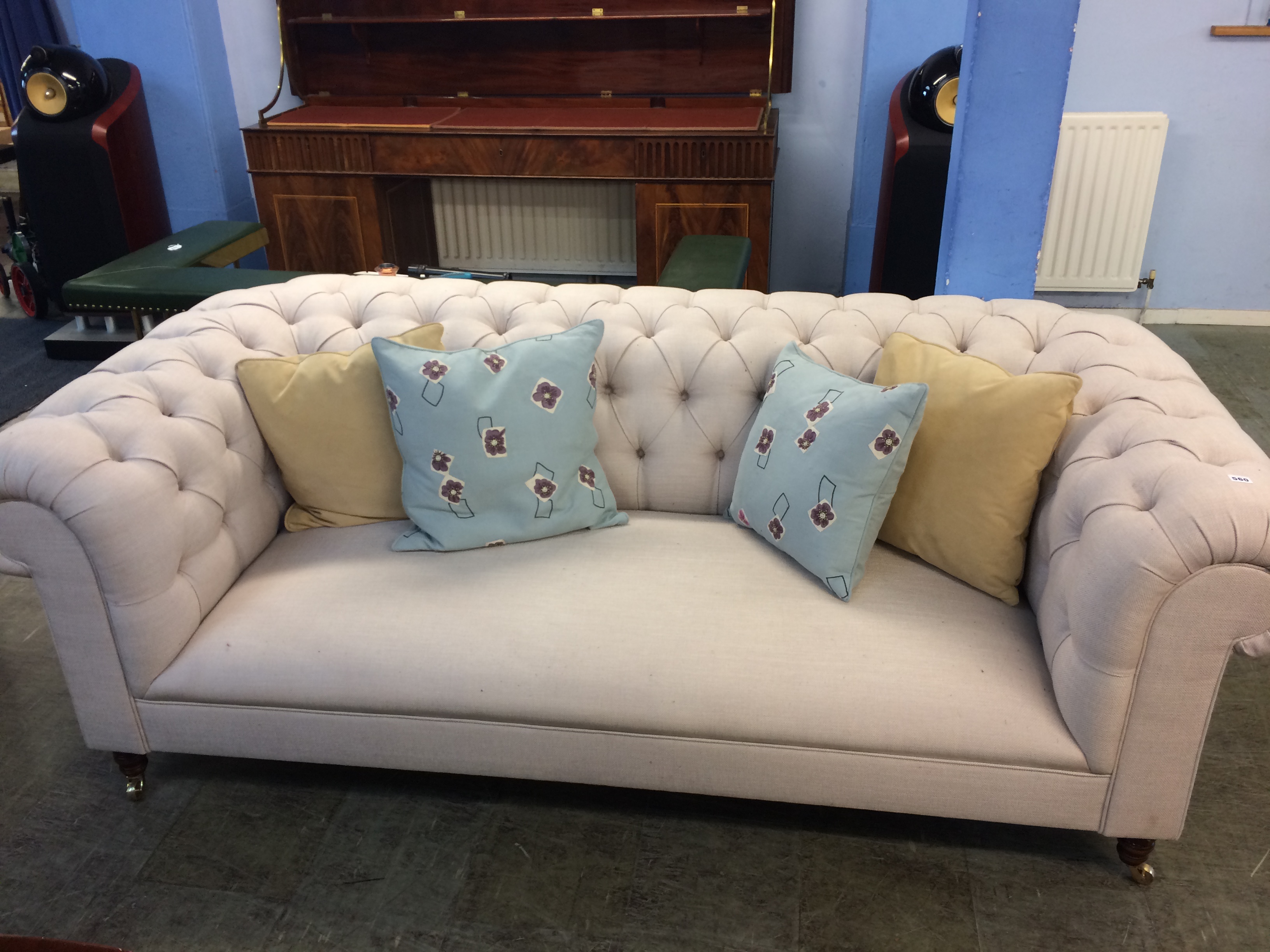 A good quality as new Chesterfield three seater settee 225cm x 110cm x 70cm