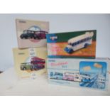 Collection of 4 boxed Corgi coaches & buses