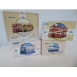 Collection of 4 boxed Corgi buses