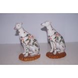 A pair of oriental ceramic dogs
