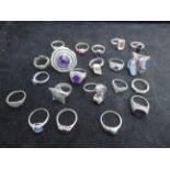 Collection of silver rings and others