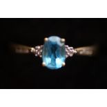 9ct Gold ring set with blue stone and diamonds